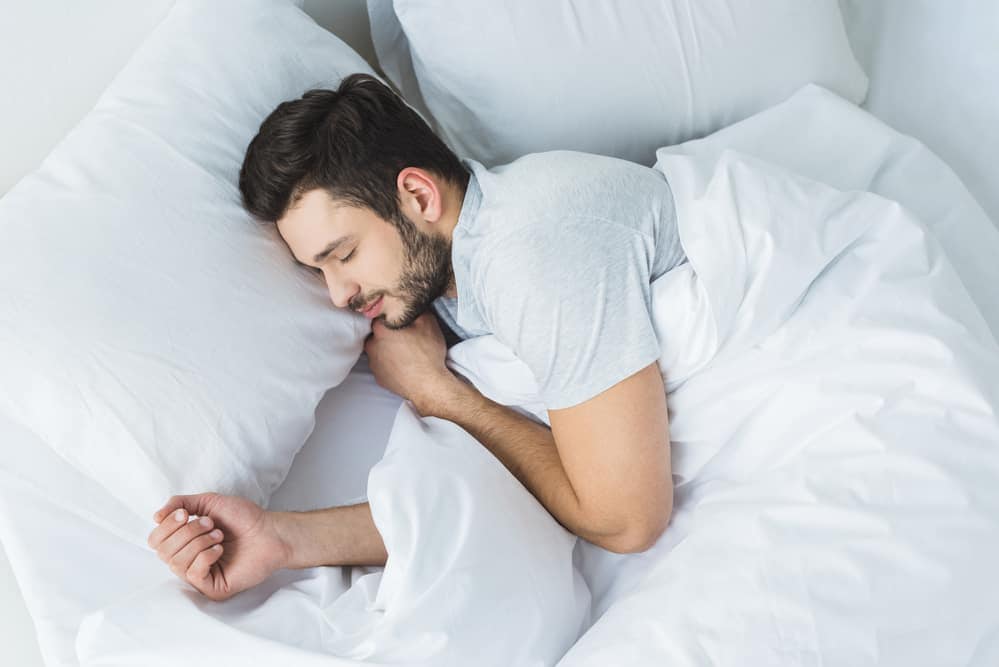 Men sleeping in T-shirt